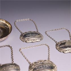 Group of silver, comprising silver mounted cigarette box, five decanter labels, page turner, commemorative teaspoon and a commemorative pin dish set with coin, all hallmarked