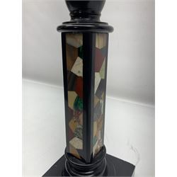 Black stone column candlestick, with mineral specimens upon two sides, H30cm