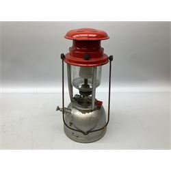 Copper and brass ship’s lamp marked ‘Anchor’, H25cm, Feuer hand storm lantern, Bialaddin Model 315 paraffin lamp and an Anchor lamp (4)