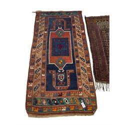 Turkish rug or wall hanging, blue ground field with decorative panels, with geometric motifs and multi-band border (207cm x 104cm), and a prayer rug with repeating border and geometric motifs (150cm x 92cm)