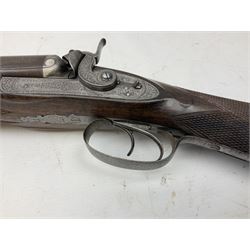 19th century John Jefferson of Scarborough 6-bore (modern 4-bore) double barrel side-by-side percussion gun, with 81cm stub twist damascus barrels (no provision for ramrod), well figured walnut stock with fine chequered grip and fore-end with horn tip and steel butt plate with long tang, well engraved lock and hammers with half-cock safeties on both sides, barrel sling swivel but rear sling swivel removed and replaced with silver escutcheon, London proofmarks, NVN, L128cm