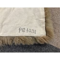 Alpaca rug/wall hanging depicting a gorilla on a cream background 