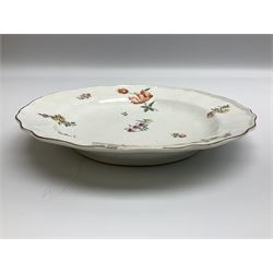 Mid 18th century Chelsea red anchor period plate, circa 1752-1758, of circular form hand painted with floral sprays and sprigs, the wavy edge with iron red rim line, with painted red anchor mark beneath, D21cm