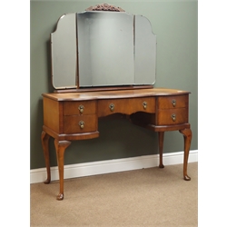  Mid 20th century mahogany dressing table, three piece raised shaped mirror back, serpentine top, central drawer and four smaller drawers, cabriole legs, W120cm, H150cm, D50cm  