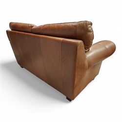 Two-seat hardwood-framed sofa, traditional shape with rolled arms, upholstered in tan leather, on block feet