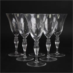 Set of six Murano clear glass wine glasses, each with part moulded fluted flared bowl, upo...