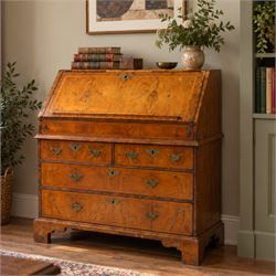 18th century figured walnut bureau, the sloped fall-front enclosing fitted interior with s...