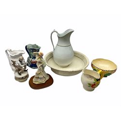 The Leonardo collection figure 'the promenade' together with Royal ivory bowl in sunset ware pattern, a jug and wash basin etc.  
