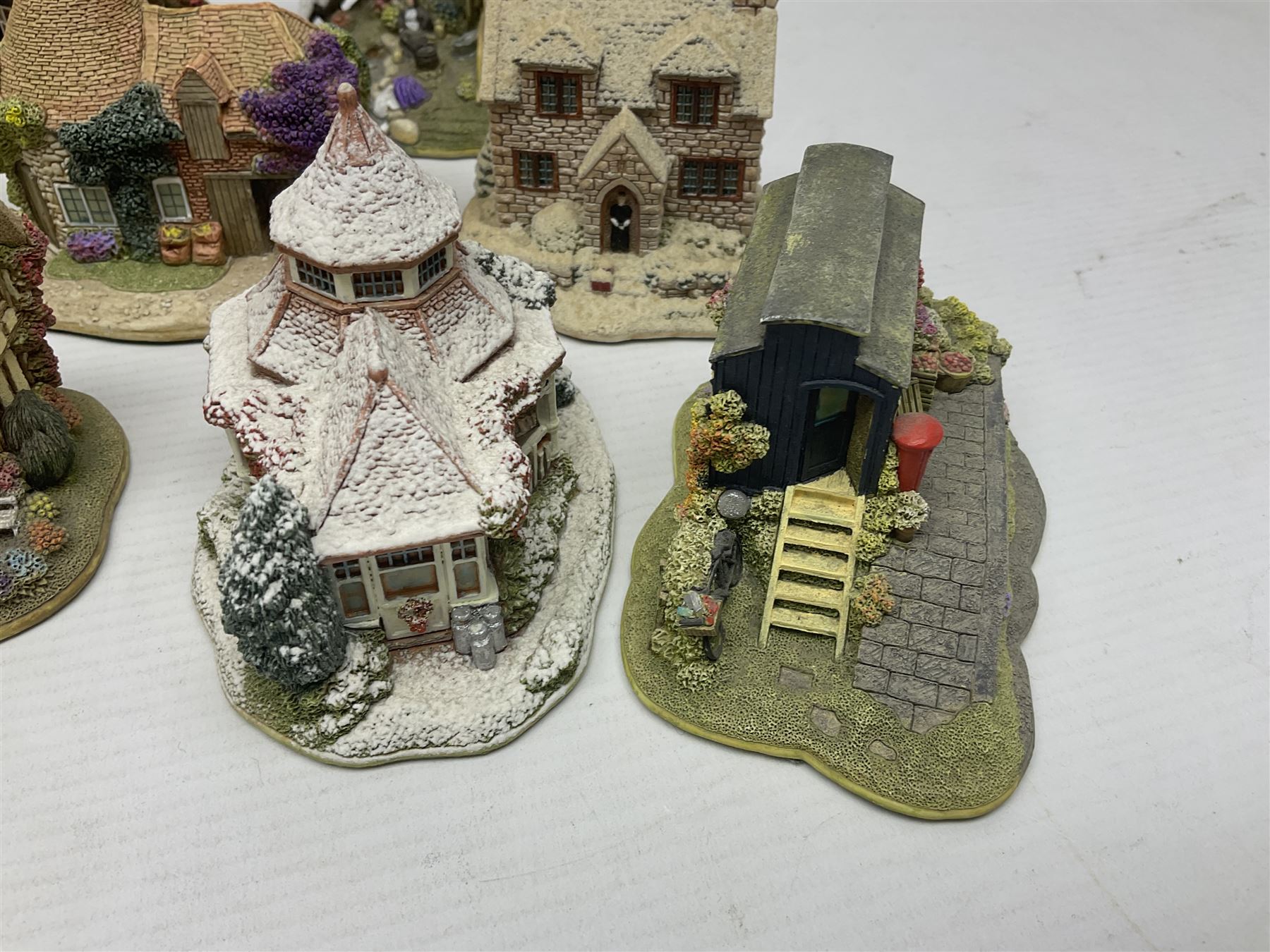 Twenty Lilliput Lanes, including The Right Note, Chatterbox Corner, Whistle Stop Gate, New Neighbours, Travellers Rest etc, all in original boxes