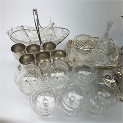A quantity of assorted silver plate and other metalware, to include a spirit kettle, pedestal bowl, swing handled tray, salver, various goblets, cruets, assorted flatware, plus a selection of glassware, to include a cut glass jar and cover, rose bowl, drinking glasses, etc. 
