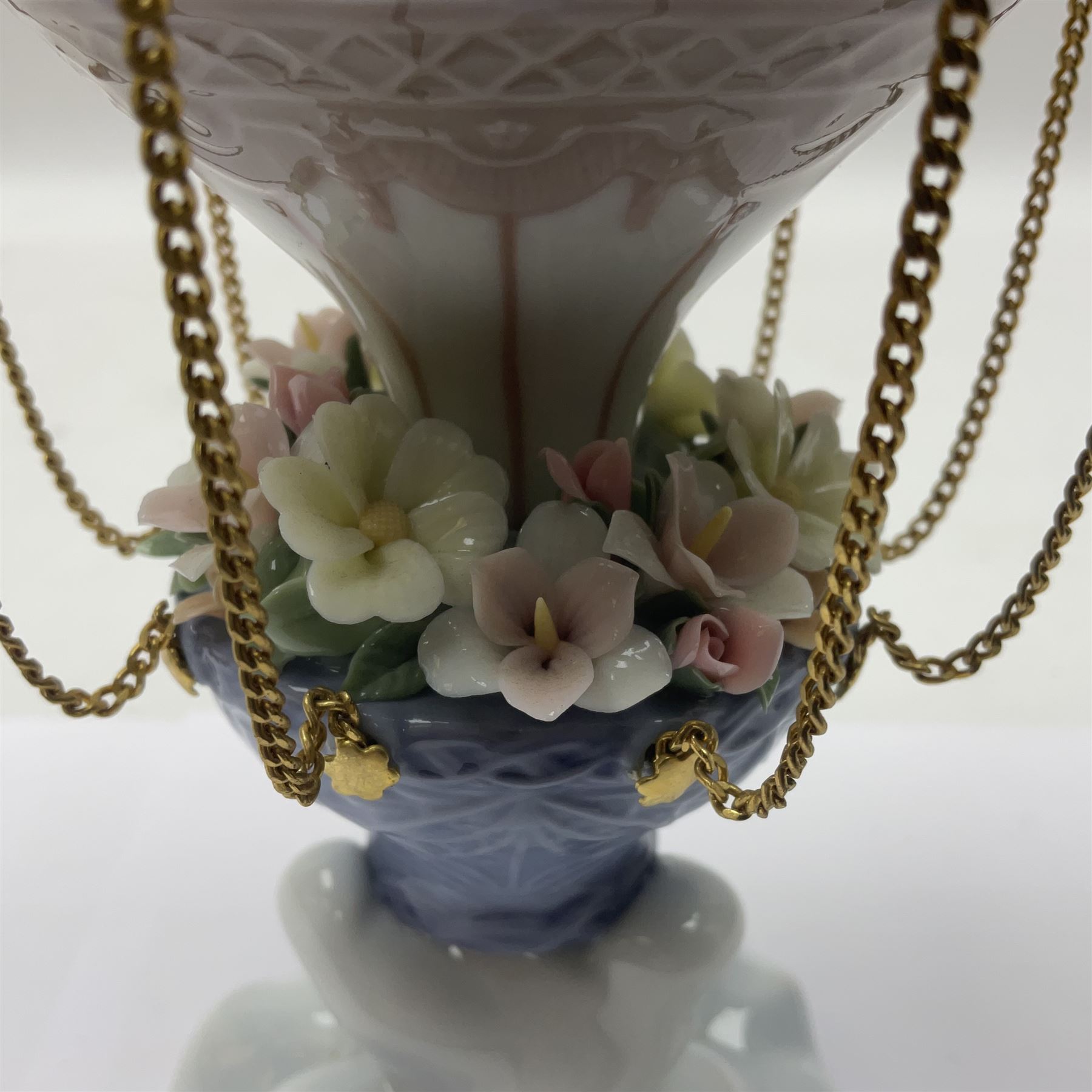 Lladro Flying High, modelled as a hot air balloon, with brass chains to suspended blossom filled basket, no 6523, with original box, H23cm