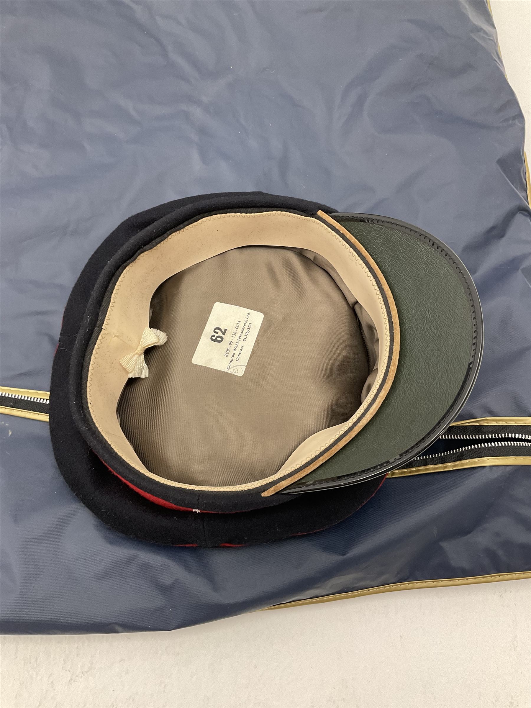 RAF Flight Lieutenant's uniform with peaked cap and WW2 ribbon bar; WW2 gas mask in blue canvas bag dated 1942; flying helmet date 1984; and British Army Major's uniform with Staybrite buttons and peaked cap