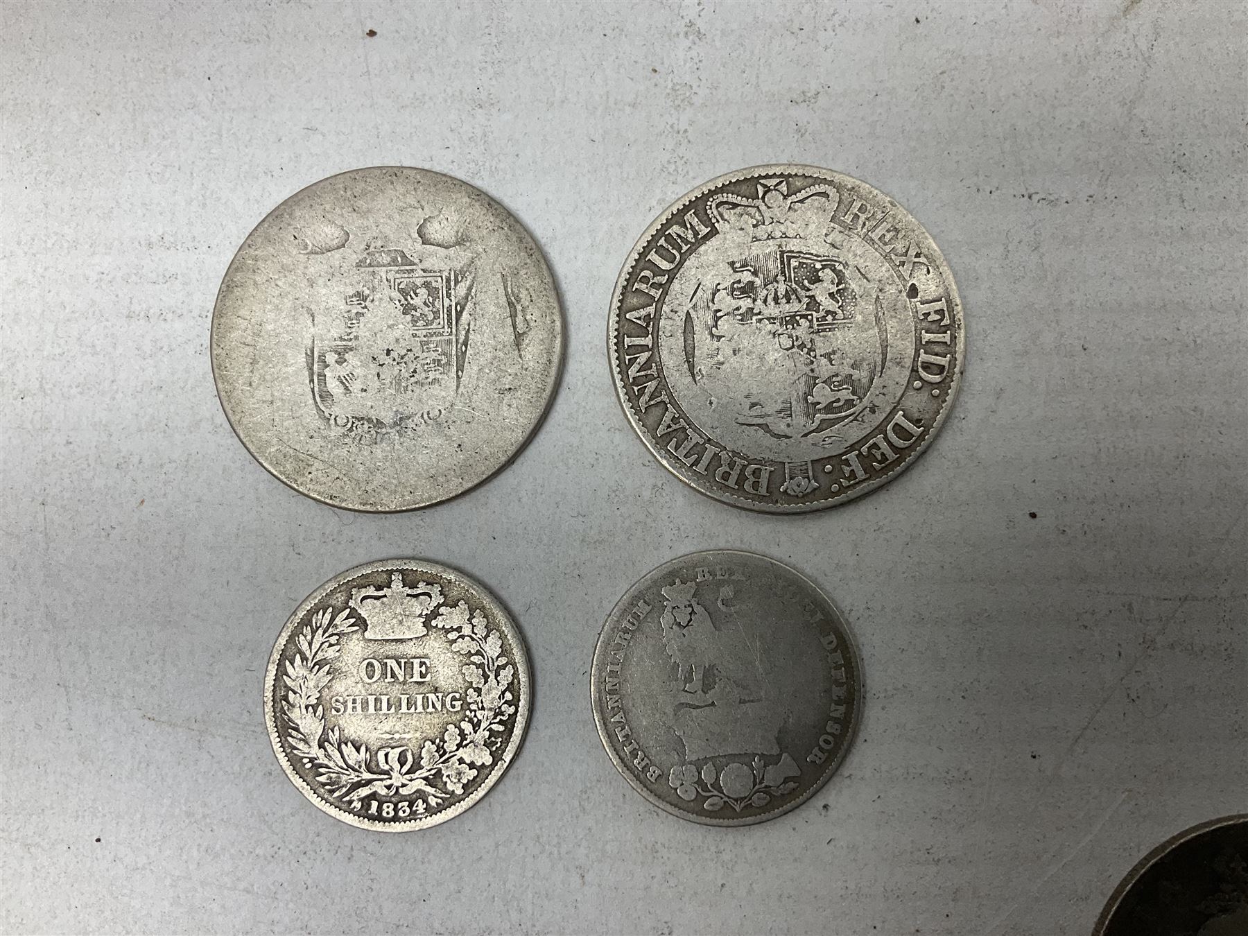 Approximately 120 grams of Great British pre 1920 silver coins, including George III 1819 half crown, William IIII 1834 shilling, Queen Victoria 1892 half crown, various silver threepence pieces etc