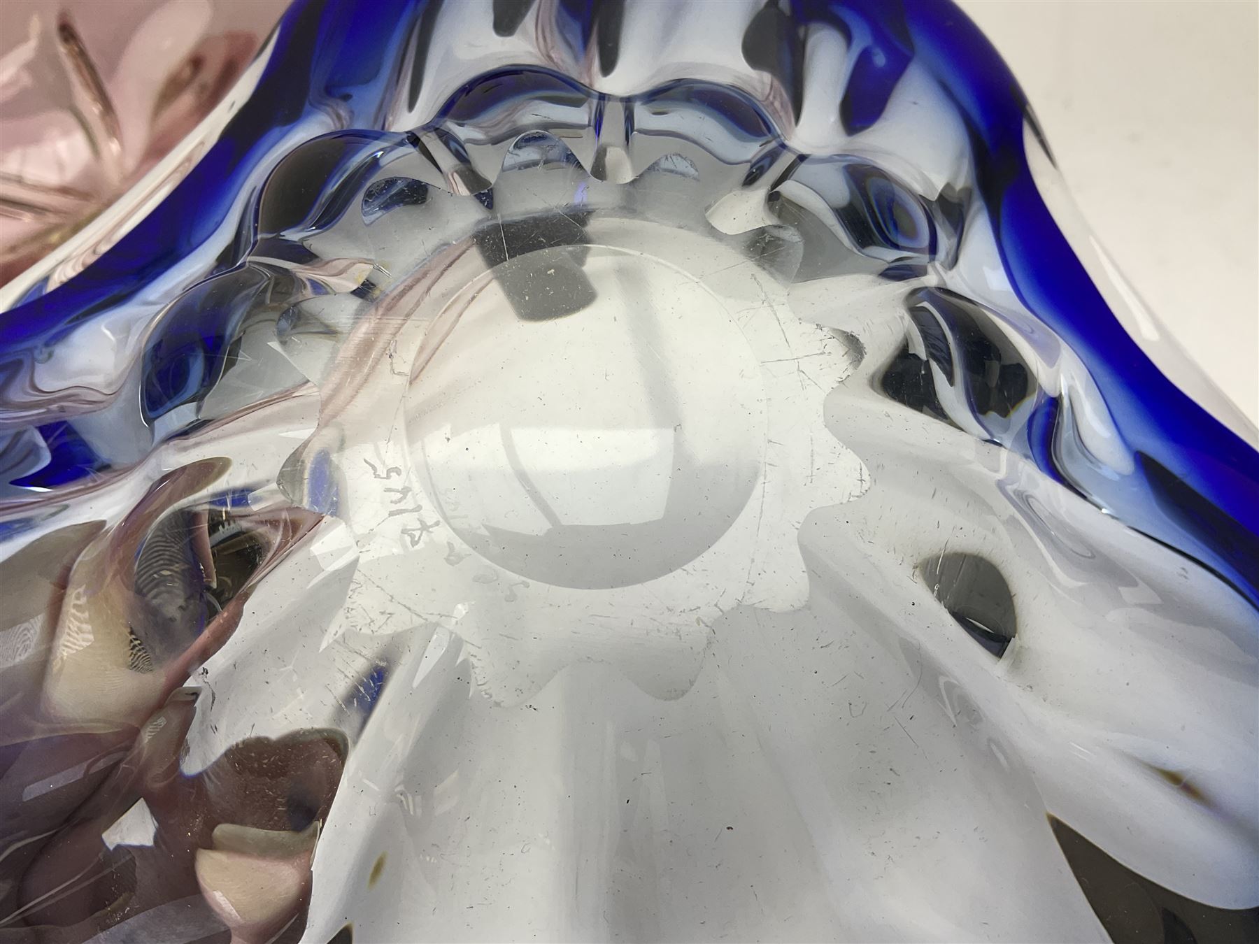 Two Whitefriars glass jugs, together with a Swedish Pukeberg art glass vase and three art glass bowls, including large pink example, some signed to base, tallest H30.5cm