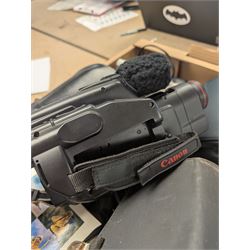 Collection of cameras, including Polaroid Joycam, Hanshing Cam digital camera, Kodak Pocket Instamatic 400, Mirage 20 cine cam, Polaroid Colorpak 80, Canon E230 camcorder, Minolta Weathermatic 35DL and a Canon Epoca camcorder