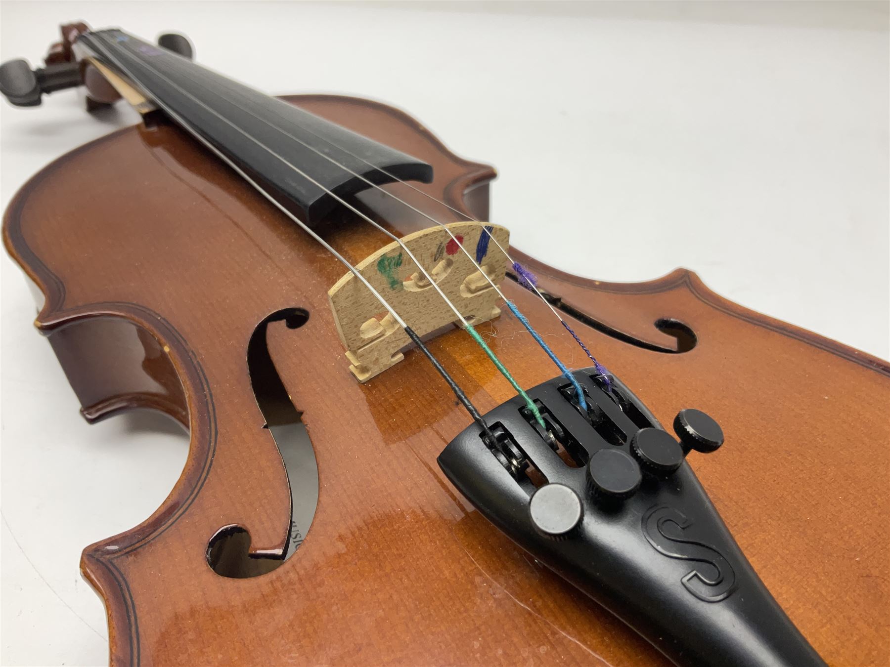 Three Stentor Student violins - three-quarter size with 33cm two-piece back; and two quarter size each with 28cm two-piece back; each in carrying case with bow (3)