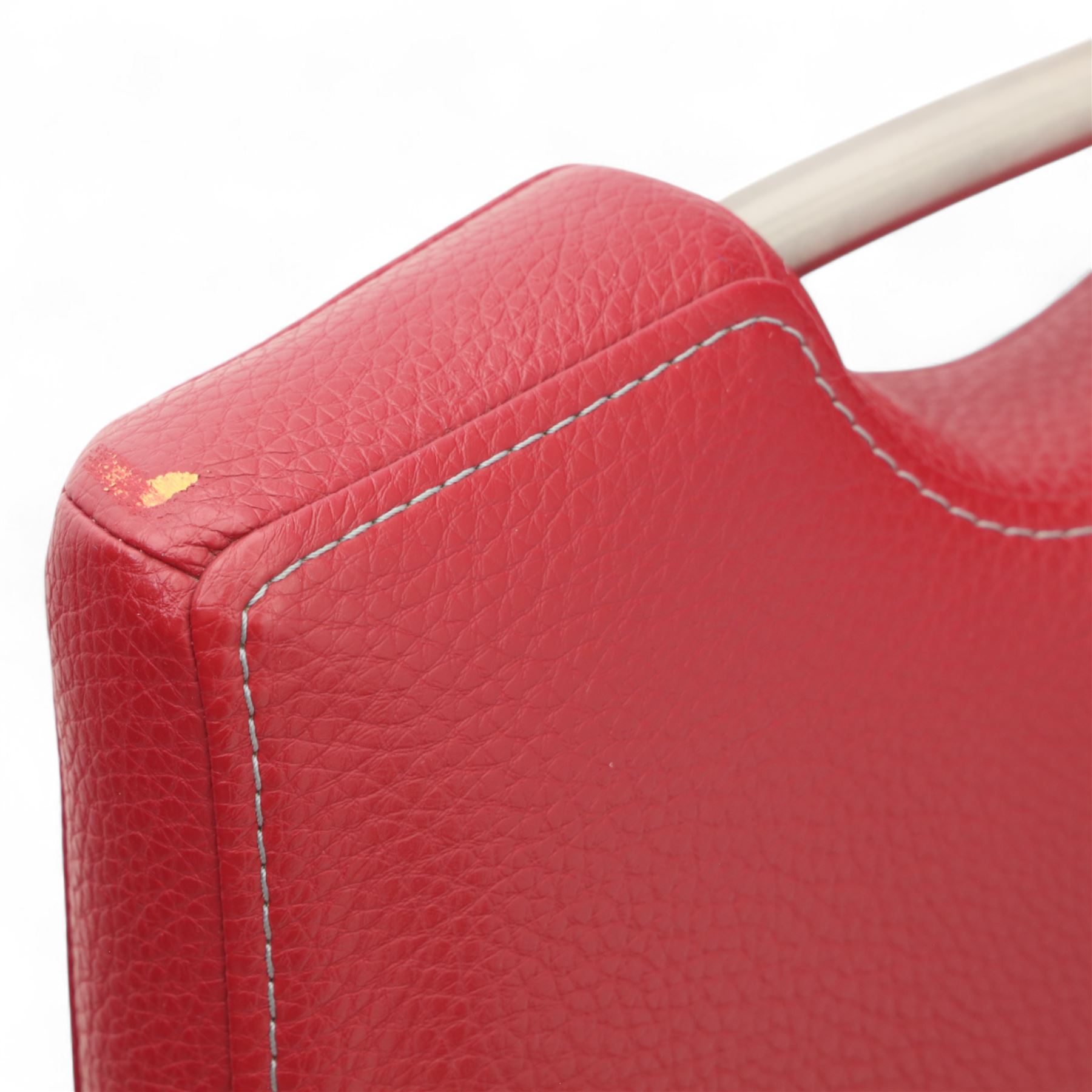 Set of seven contemporary style dining chairs, each with a high padded back and seat upholstered in faux leather on brushed steel sled bases  