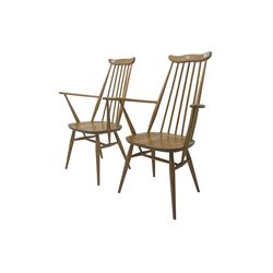 Ercol - pair elm and beech 'Windsor' open armchairs, shaped cresting rail over stick back, on tapered supports joined by H-stretchers