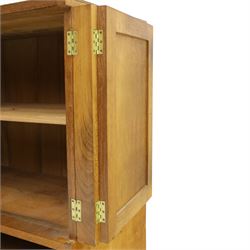 Lizardman - adzed oak media cabinet, adzed rectangular top above twin doors enclosing a shelved interior, above a fall front drawer, Yorkshire Rose carved handles, raised on castors, with carved lizard signature, by Derek Slater of Crayke  