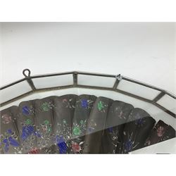 Hand painted feather and bone fan painted with figures and floral detail, in a semicircular glass display case L49.5cm. 