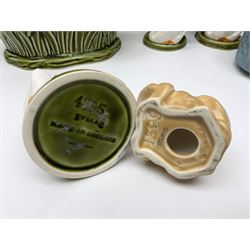 Sylvac budgieregar wall pocket, together with other Sylvac cermics including swan vases, blue tit vase and a frog figure etc, all with printed or impressed marks beneath, and a Poole Pottery cat figure, with printed mark beneath, wall pocket H22cm