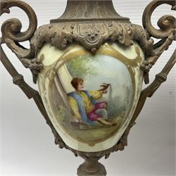 Pair gilt metal and porcelain urn clock garnitures, the urns with acorn finials and panels of figures in a landscape, H39cm