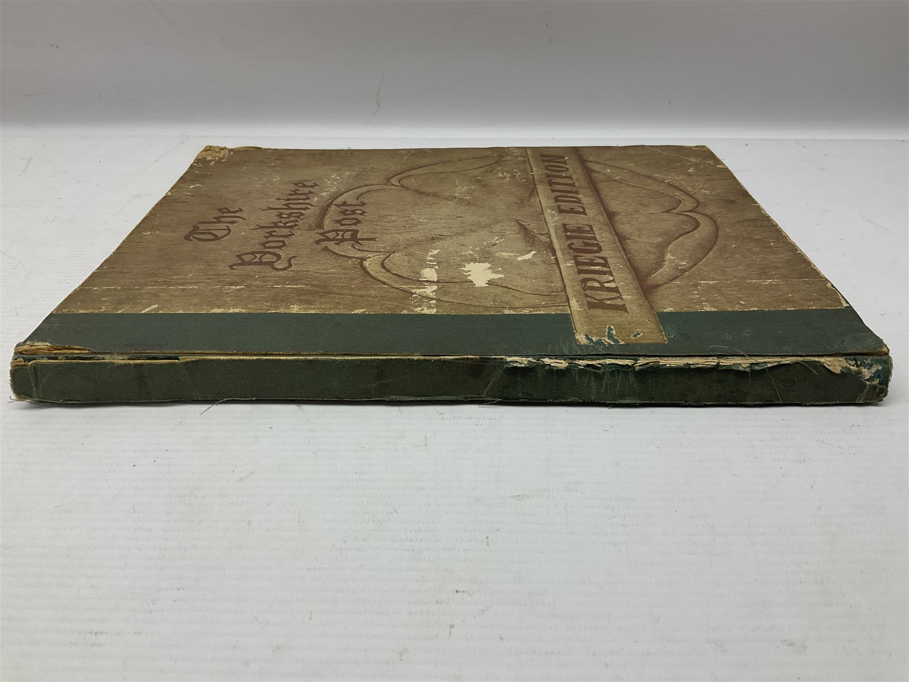 The Yorkshire Post Kriegie Edition. A 1945 book reproducing the exploits of Prisoners of War in Stalag Luft VI, with compliments letter from the publishers. Simulated wood paper covered card boards.