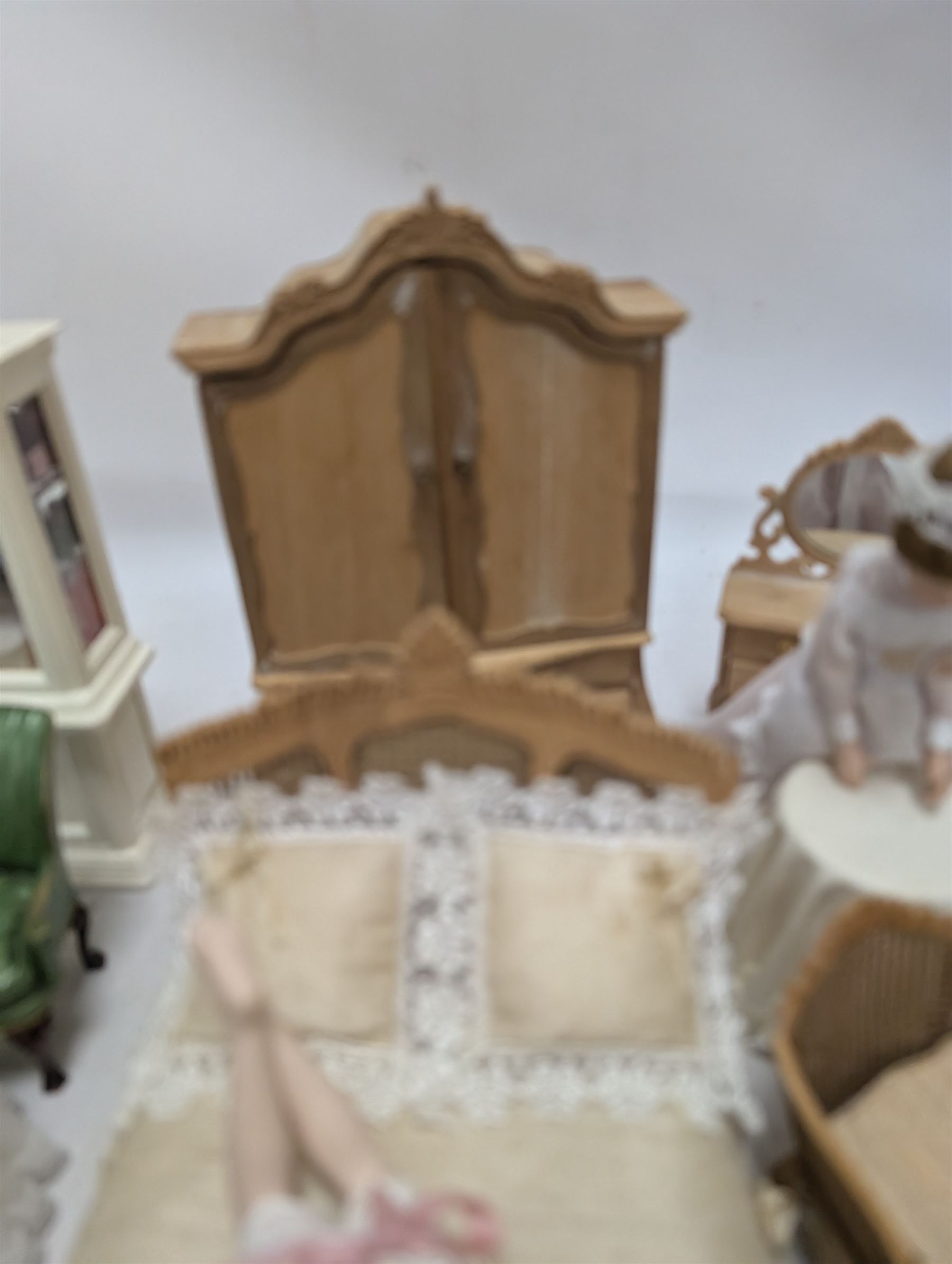 Dolls house bathroom and bedroom furniture, including bed, wardrobe, dresser filled with toiletries, shower, five figures, etc 