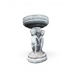 Cast stone cherub bird bath, circular removable top raised on three cherubs with ornate detailing
