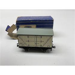 Hornby Dublo - twenty wagons including Cattle Trucks; Low-Sided Wagons; Cable Drum Wagons; Tank Wagon for Shell Lubricating Oil; Mineral Wagons; 20-Ton Bulk Grain Wagons; Goods Brake Vans; Furniture Containers etc; all in blue striped boxes (20)