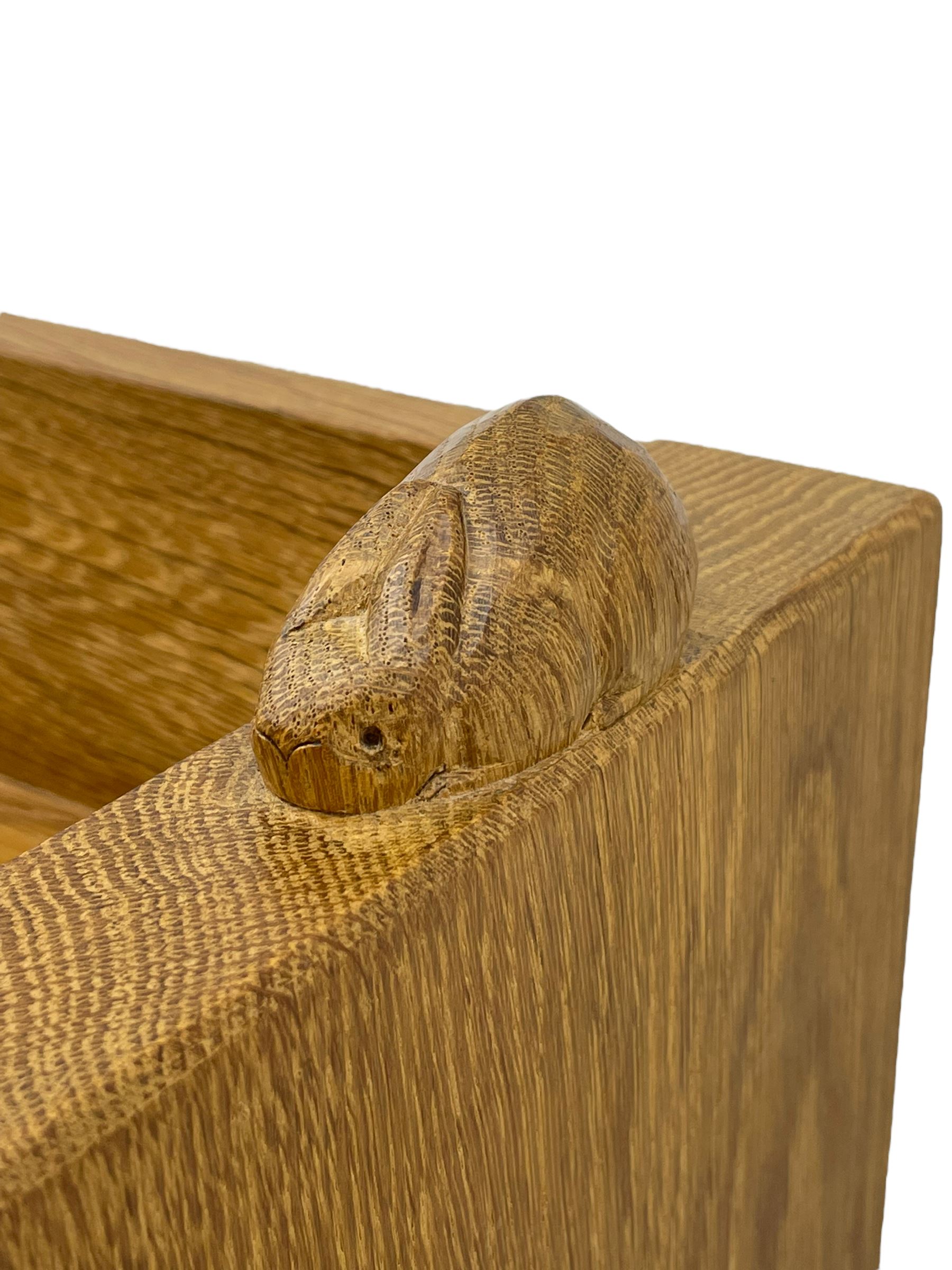 'Rabbitman' oak bookcase, fitted with three adjustable shelves, the top carved with rabbit signature, by Peter Heap of Wetwang