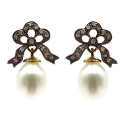 Pair of pearl drop earrings with diamond bow tops  