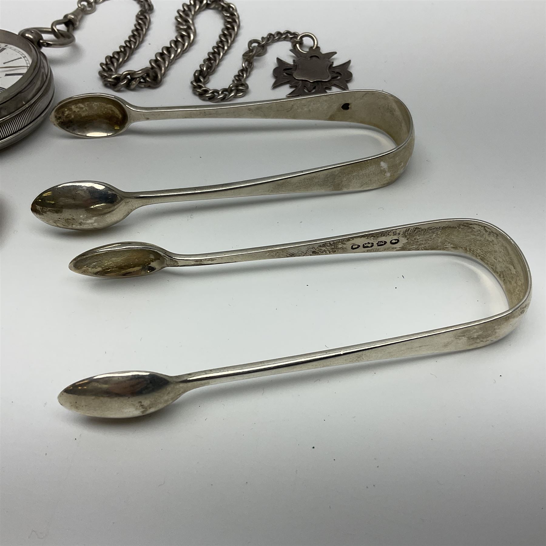Edwardian silver open face lever pocket watch, case by Alfred Wigley, Birmingham 1901, on silver tapering Albert chain, 14ct gold ladies manual wind wristwatch, two pairs of silver sugar tongs by Francis Higgins II, London 1880, silver charm and a 9ct gold cameo