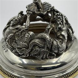 Modern limited edition silver mounted nautilus shell cup, no. 42/150, the pearlescent shell cup with silver-gilt strapwork to rim, upon a stem modelled as a putto supporting a gilt cornucopia and circular domed foot depicting Poseidon amongst swirling waves, hallmarked by St James House Company, London 1980,  H17.5cm