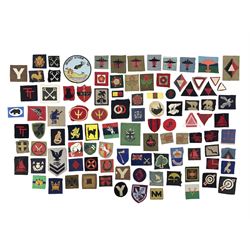 Approximately one-hundred printed and embroidered cloth badges including War Department Fleet Personnel, Air Formation Signals, HQ Northern Army Group, Commonwealth brigade, Iceland Force, 2nd, 4th, 5th, 6th, 7th, 8th, 9th and 11th Anti-Aircraft Divisions, East Africa Command, British Troops in Norway, 2nd Infantry, 44th, 47th, 48th, 49th, 50th, 55th, 56th, 59th, 61st, 78th Divisions etc