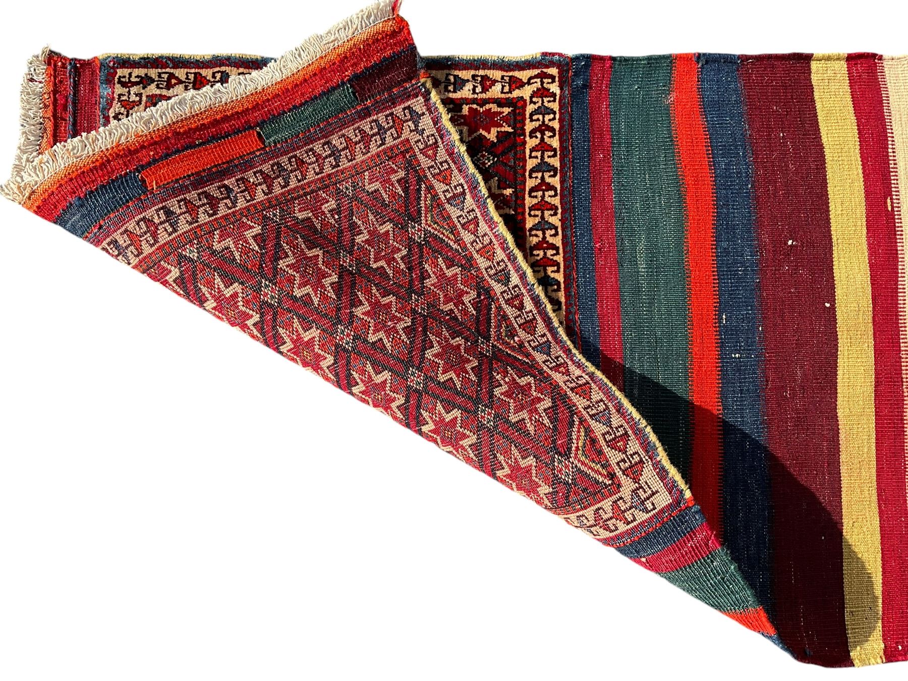 Southwest Persian Qashqai saddle bag, red and ivory ground with diamond-shaped star motifs in the top and bottom panels, central field decorated with alternating horizontal stripes