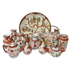 20th century Oriental Kutani style ceramics, to include a large charger decorated with four figural scenes, with three character mark beneath, together with similar vases and teapots, charger D34cm