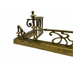Brass fire curb, with pillar support and scroll decoration H27cm L135cm. 