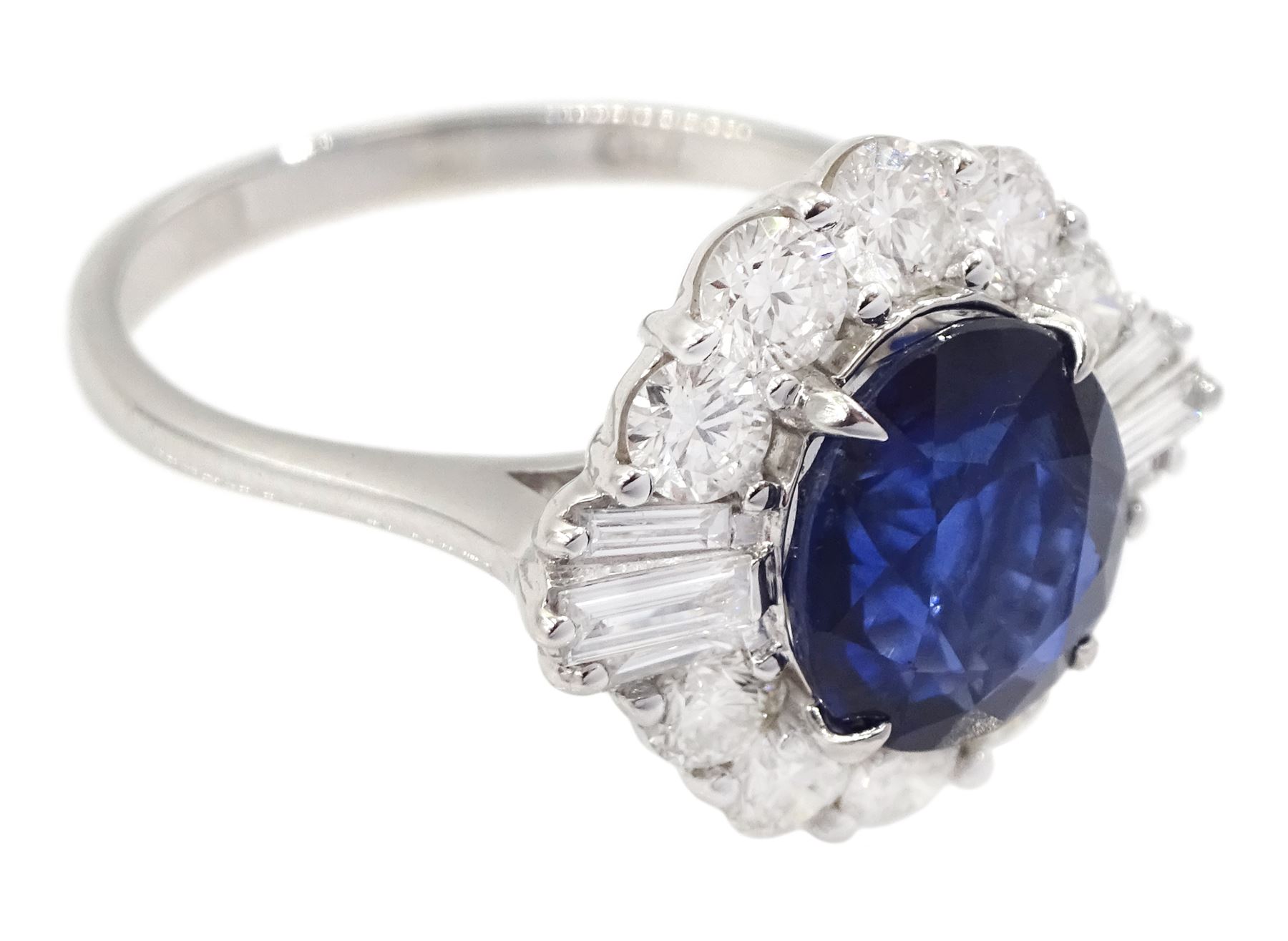 18ct white old oval sapphire, round brilliant cut and baguette cut diamond cluster ring, stamped 750, sapphire 2.93 carat, total diamond weight 1.07 carat, with World Gemological Institute Report