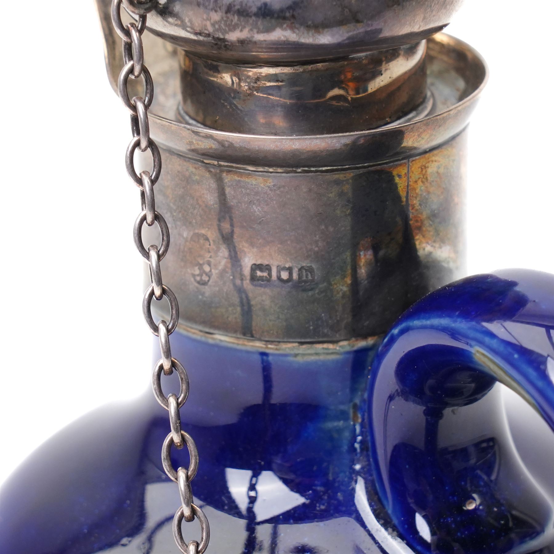 Royal Doulton decanter, designed my Marion Holbrook, of Art Nouveau design with London 1903 silver collar and stopper, H23cm 