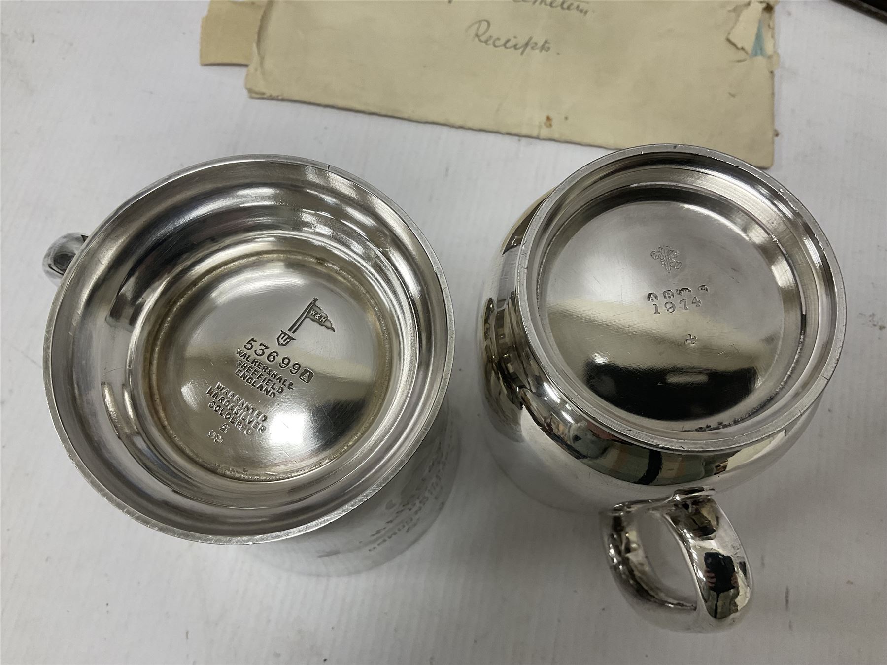 WWI bronze death plaque to Edwin Smith, together with two tankards presented to E.Smith and photographs of his family  