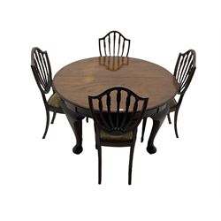 Early 20th century mahogany circular extending dining table, two additional leaves, on cabriole supports (D128cm - L219cm, H72cm), together with four Hepplewhite mahogany dining chairs with upholstered drop in seats (table currently fixed, mechanism removed and not present)