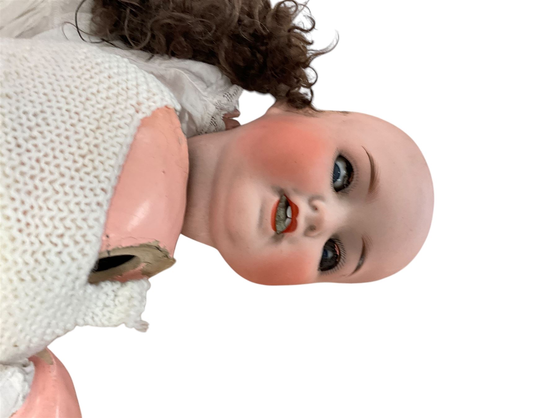 Two German porcelain dolls with moveable limbs