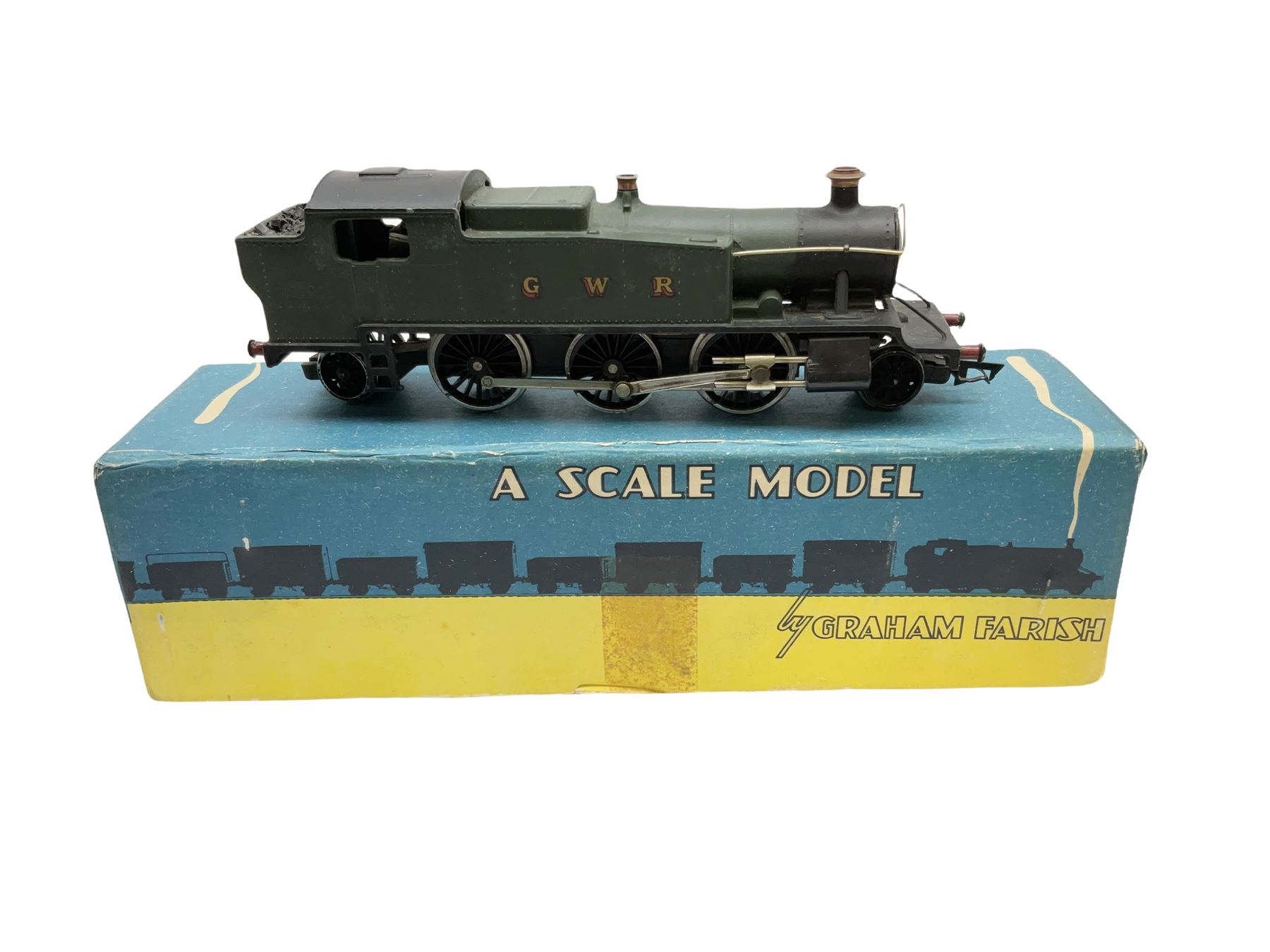 Graham Farish '00' gauge - four locomotives comprising GWR Class 81xx 2-6-2 Prairie Tank in BR black, cast No.8103; GWR Class 81xx 2-6-2 Prairie Tank in GWR green, cast No.8103; both in original boxes; Southern Class Q 0-6-0 with tender, cab sides cast with FORMO, in BR black; and another 0-6-0 with personalised gilt No.564; both unboxed (4)