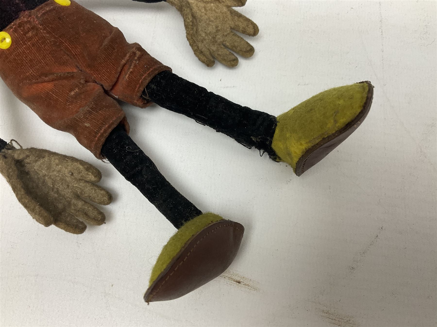Deans Rag Book Mickey Mouse soft toy, circa 1930's, black velveteen head and body, with cream face and hands, red shorts and yellow felt shoes, marked Reg. No. 750811 to neck H19cm