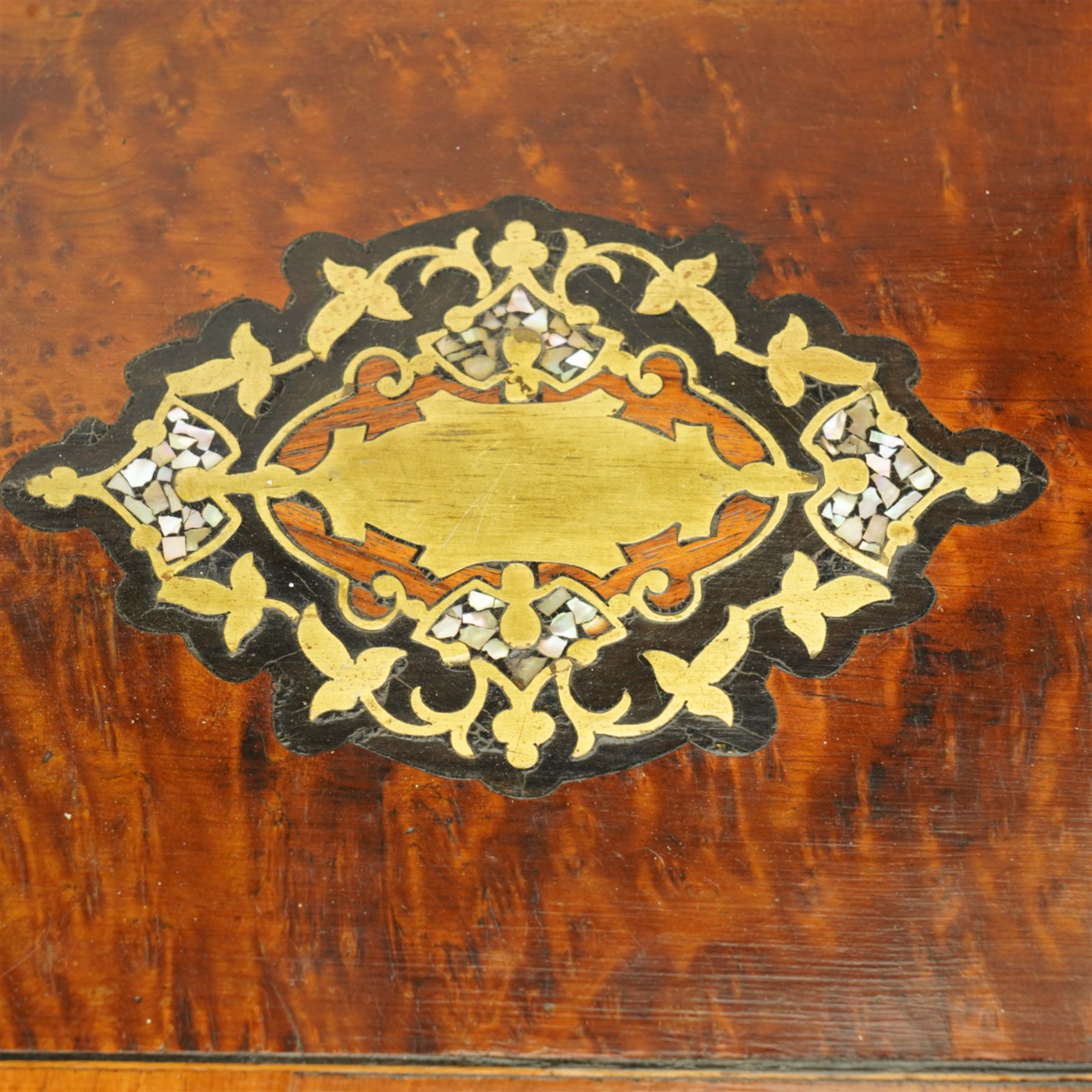 19th century French Boulle-style cave à liqueur or travelling decanter set, with musical mechanism playing carrara bonne de ay and Locked in the old Kent Road, the walnut box of serpentine front, the hinged lid with central brass and mother of pearl cartouche, with removable wooden tiered tray with gilt metal handle, containing four foliate etched glass decanters and sixteen glasses, H27cm