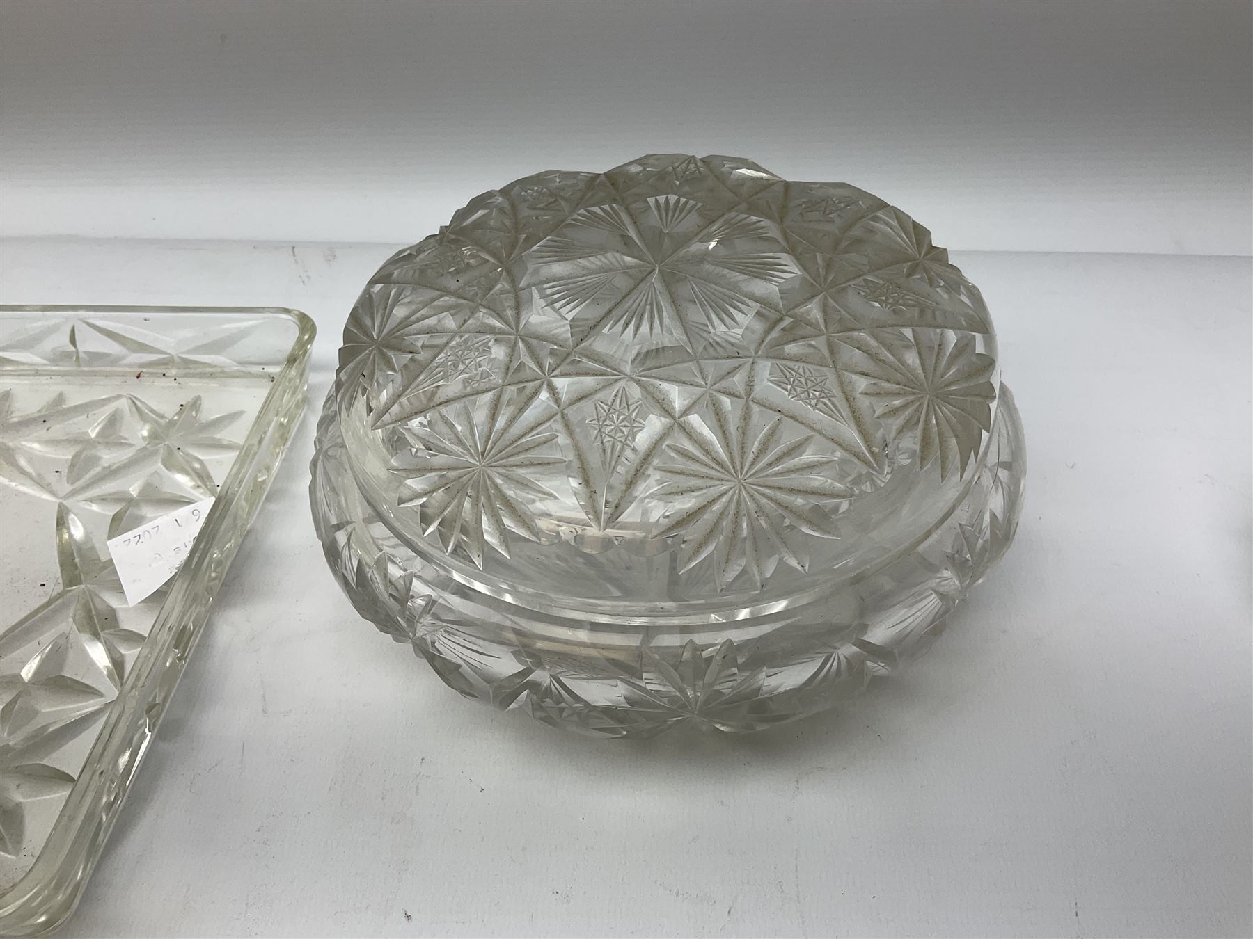 Glass dressing table tray, scent bottles and lidded bowl, metal mounted foliate design hair brushes and handheld mirrors etc