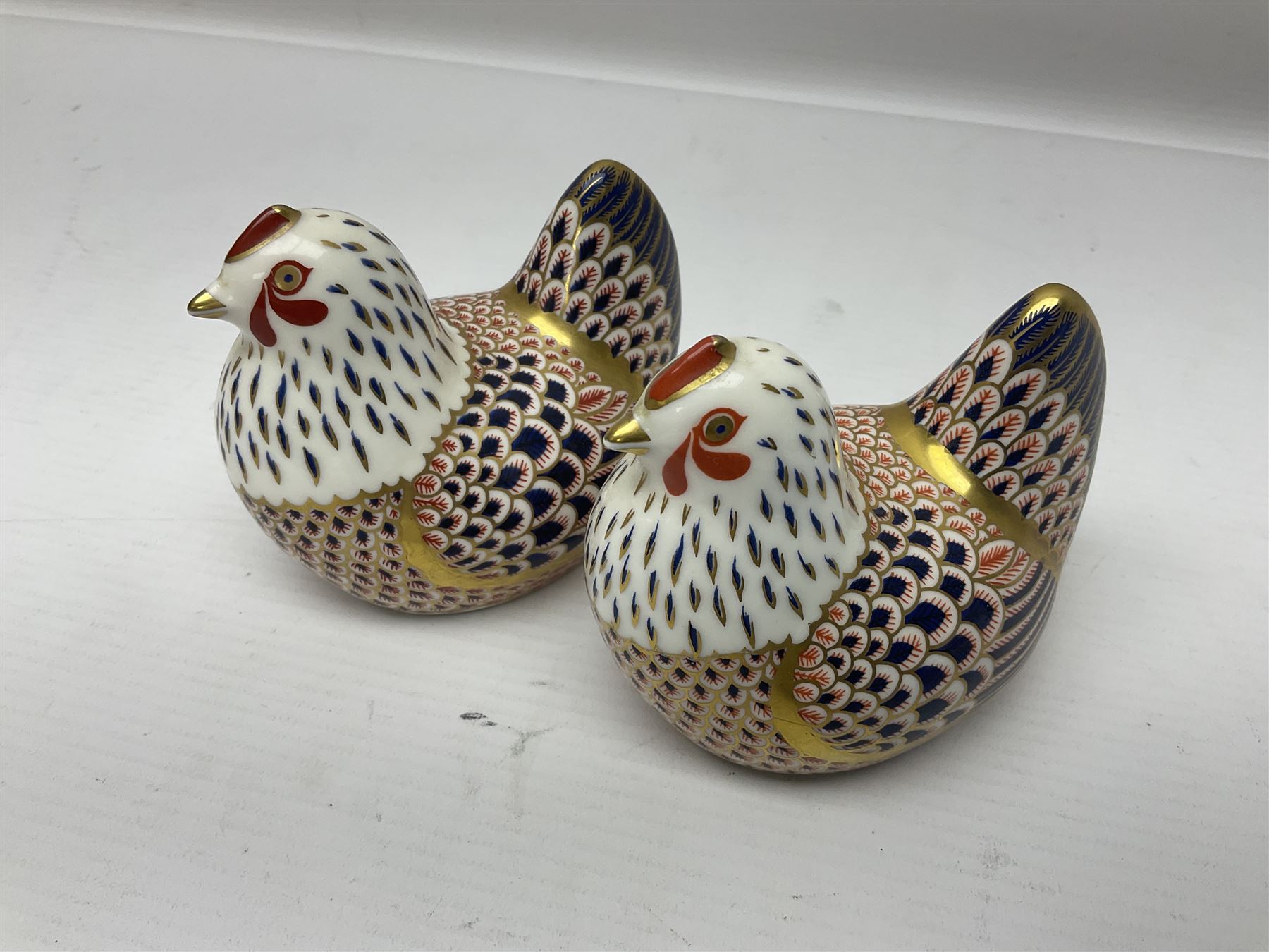 Seven Royal Crown Derby Paperweights, to include Field mouse with silver stopper, Dormouse, Chicken etc,  six without stoppers   