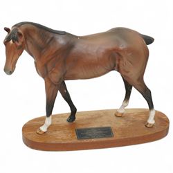 Three Beswick Connoisseur Series racehorses 'Grundy' No.2558, 'The Minstrel' No.2608 and 'Troy' No.2674 and Country Artists racehorse 'First Home' all on wooden plinths (4)