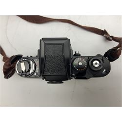 Nikon F3 SLR camera, serial number 1583609; Nikon 50mm 1:1.8 lens; Nikon 28-85mm 1:3.5-4.5 zoom lens; Vivitar MC 2X-3 Tele Converter, and a Nikon Speedlight SB-16 flash